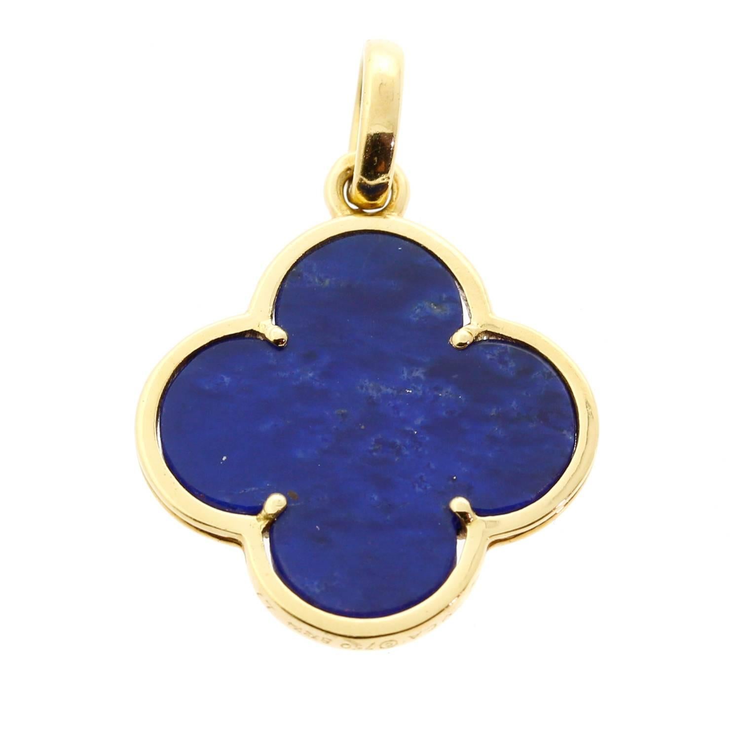 A magnificent Van Cleef & Arpels necklace pendant crafted in 18k yellow gold featuring a lapis stone.