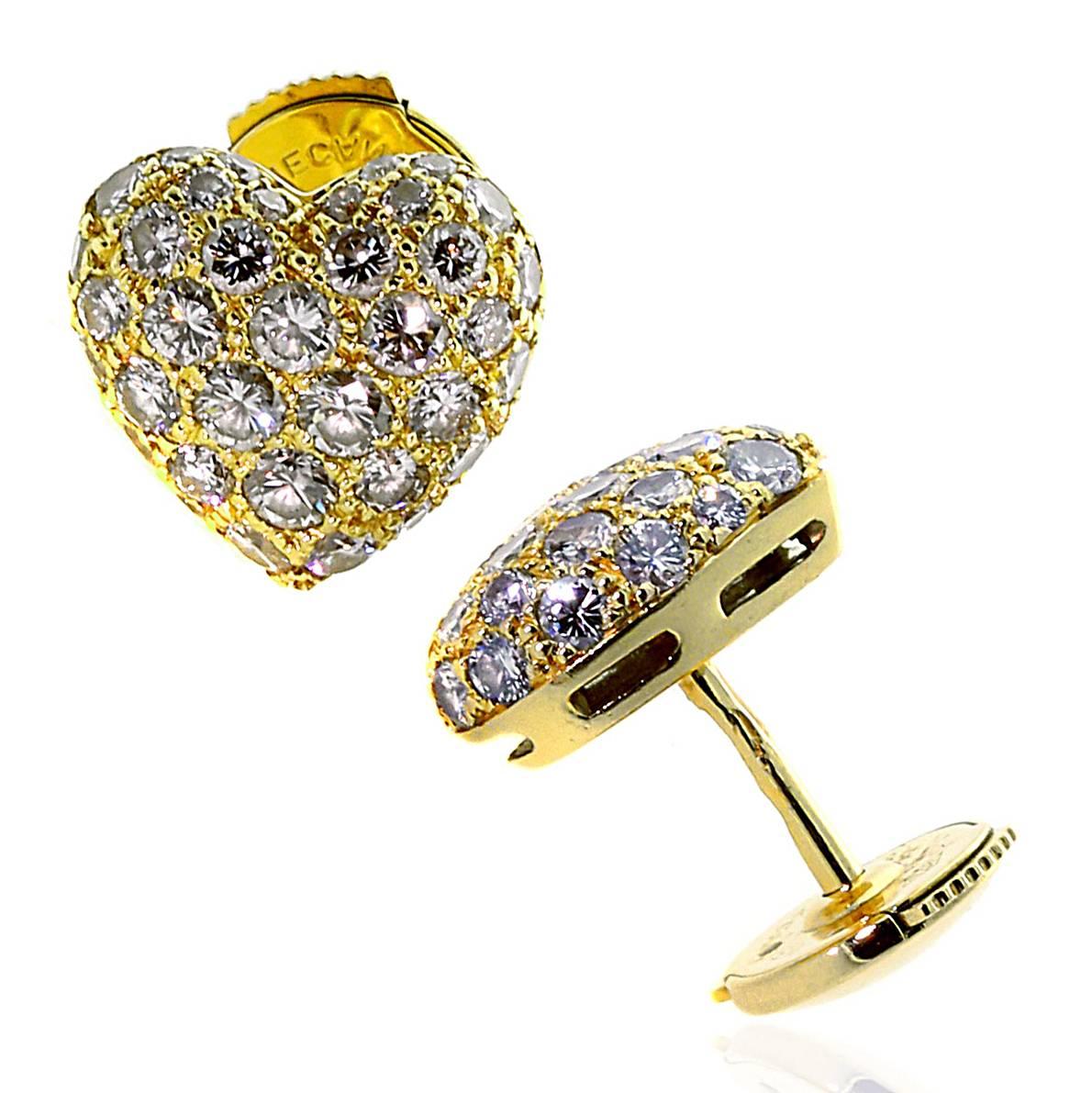 A chic pair of Cartier heart earrings set with 1.5cts appx of finest Cartier round brilliant cut diamonds in 18k yellow gold. The earrings measures .39" in diameter.

Cartier Retail $15,000 + Tax

