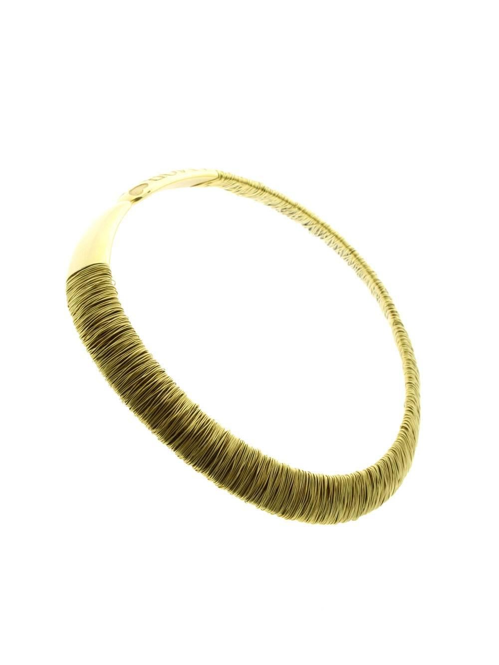 A magnificent Pasquale Bruni choker crafted in 18k yellow gold featuring a flawless marriage of classic design and modern elements. Weight: 117.5 Grams Measurements: The necklace measures .59″ inches wide Necklace Length: 15.5″

This magnificent