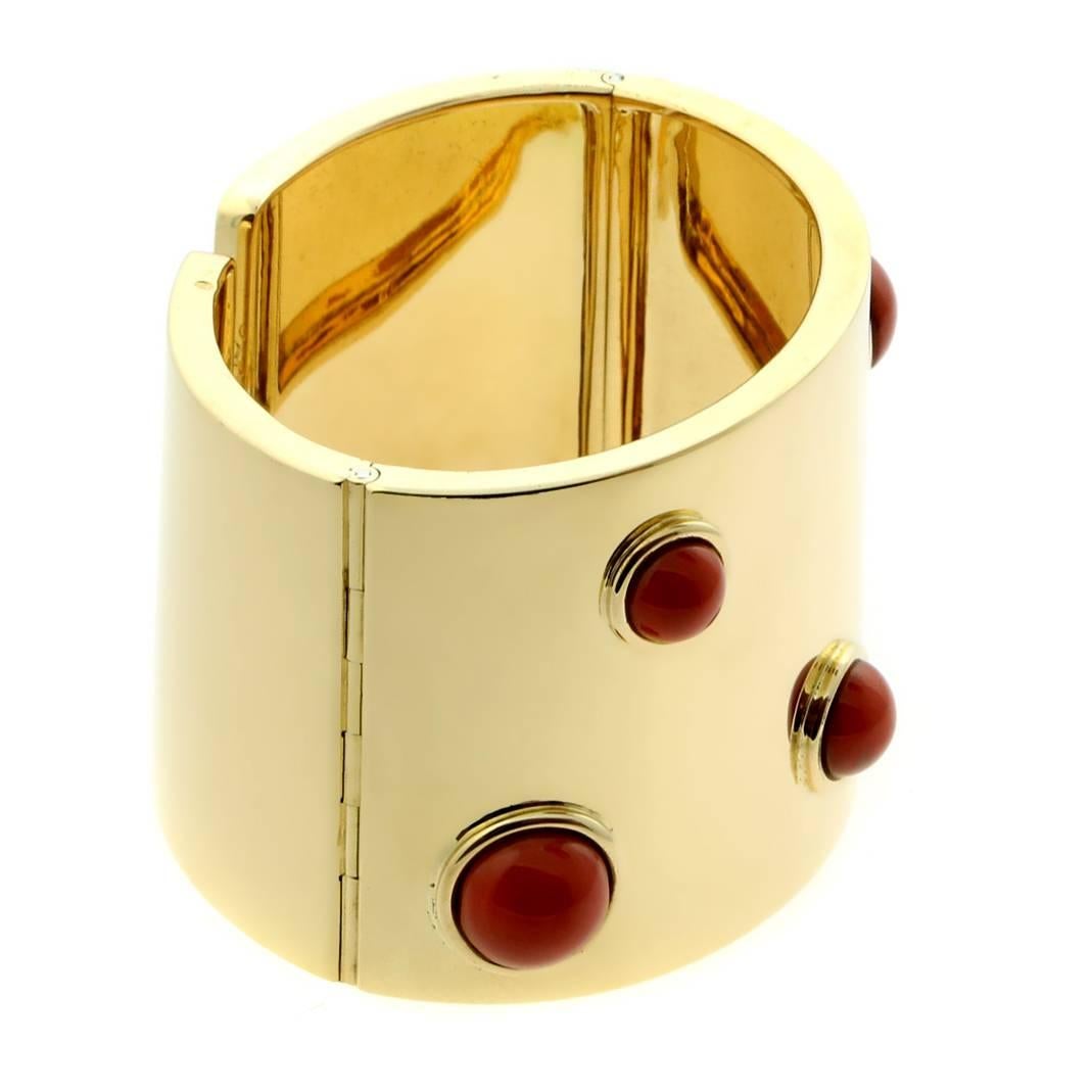 A fabulous Fred of Paris bangle with Coral expertly placed on this glorious 18k  Cuff Bracelet. The bangle has a weight of 104.5 grams and measures 2.16" wide.

Fred of Paris Retail: $28,000+ Tax