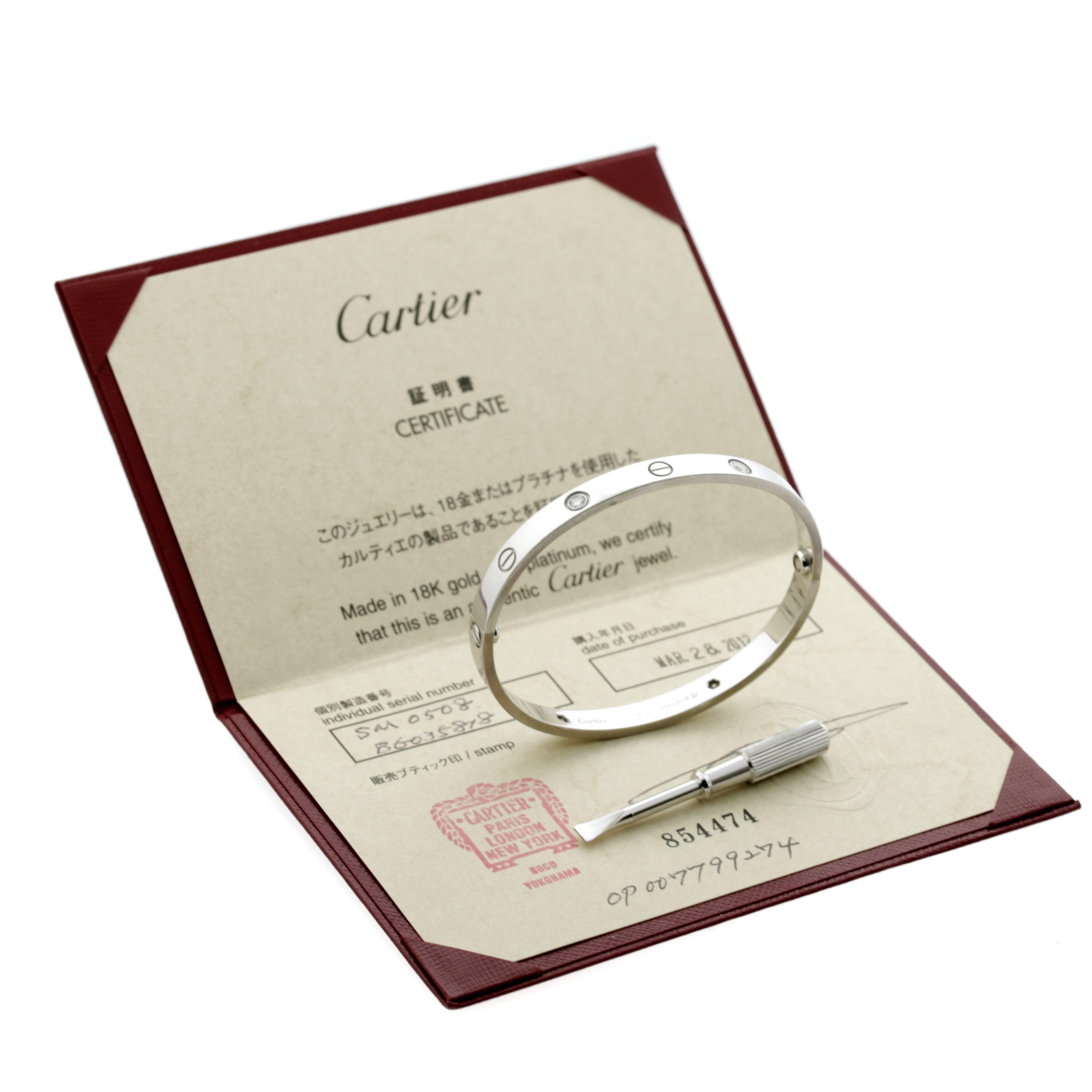 A fabulous authentic Cartier Love diamond bangle featuring 4 round brilliant cut diamonds (.40ct) in 18k white gold. Size 18cm

Cartier Retail: 10,200 + Tax