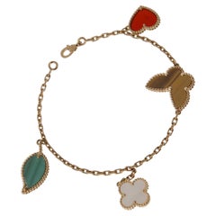 Van Cleef & Arpels Lucky Alhambra Gelbgoldarmband mit 4 Motiven