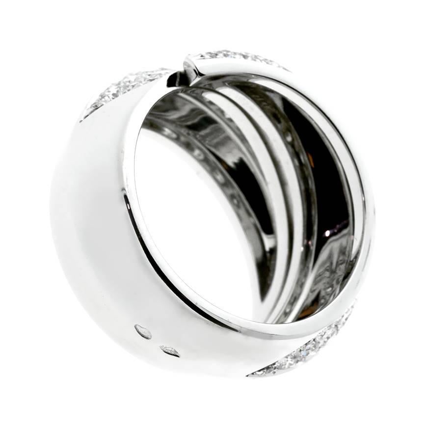 An iconic Cartier panthere bypass ring featuring the finest Cartier round brilliant cut diamonds (1.7ct appx) set in 18k white gold.

The ring measures a size 6, 52 European