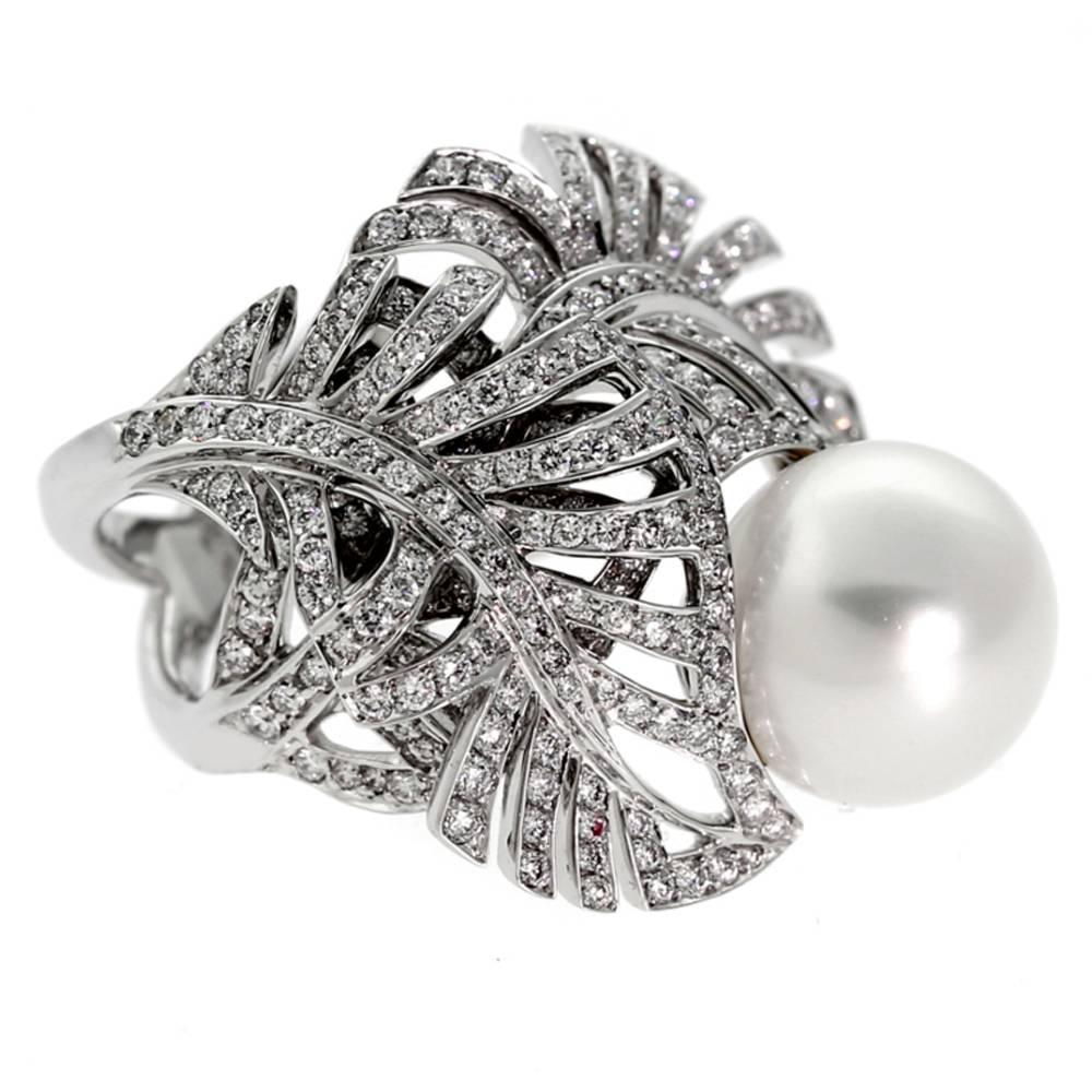 A magnificent authentic Chanel pearl and diamond ring featuring 1.72ct of the finest round brilliant cut diamonds set in 18k white gold.

This magnificent piece is offered by Opulent Jewelers, we are an accredited boutique dedicated to sharing our