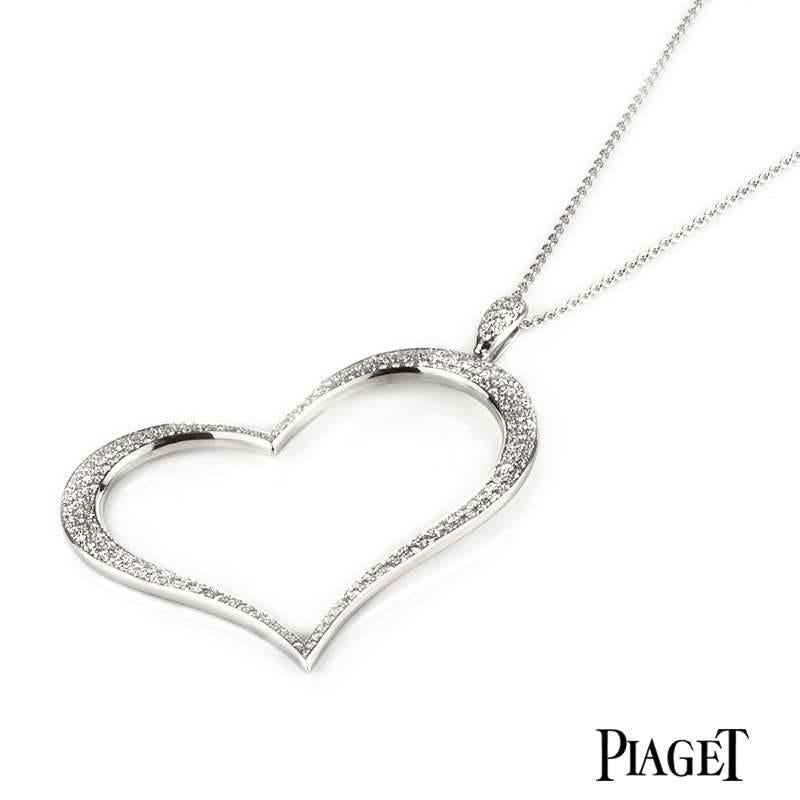 An 18k white gold Piaget heart pendant. The heart motif is set with 68 pave set round brilliant cut diamond totalling approximately 0.77ct. A further 13 round brilliant cut diamonds are set in the bale of which is set to the right side of the heart.