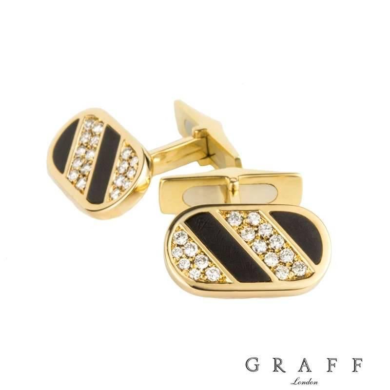 A stylish pair of Diamond and Enamel Cufflinks by Graff in 18k yellow gold. Each cufflink incorporates an enamel pattern and has 17 Round Brilliant cut diamonds, Colour F, Clarity VS. Total 0.86ct with a T-Bar fitting, Gross weight 18.05 grams.