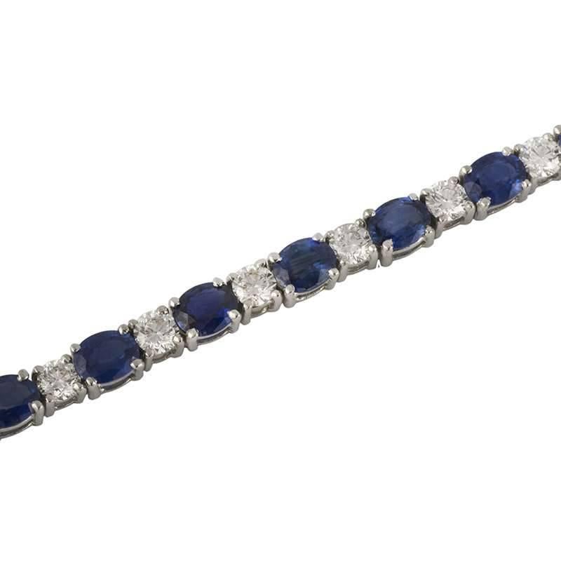A stunning 18k white gold diamond and sapphire bracelet. The bracelet is set with alternating round brilliant cut diamonds and oval cut sapphires all set in a four claw setting. The diamonds have a total weight of 3.26ct, F/G in colour and VS/SI in
