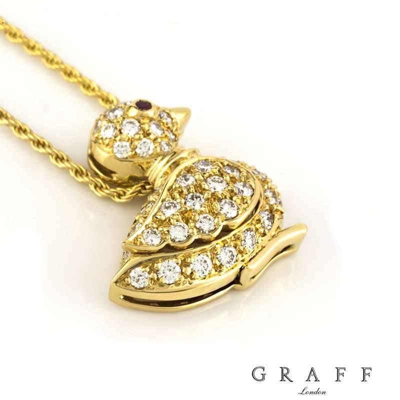 A beautiful diamond set duck pendant by Graff. The duck is set with a single ruby for the eye and 44 round brilliant cut pave set diamonds across the body, wing and head totalling approximately 0.80ct, predominantly F in colour and VS clarity. The