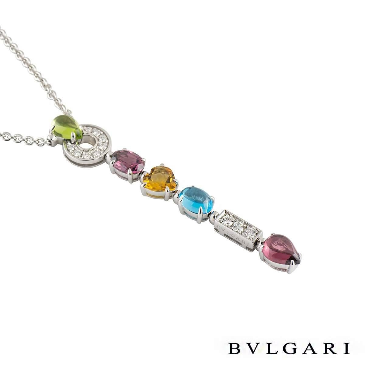 An 18k white gold multi gemstone and diamond necklace from the Bvlgari Allegra collection. The necklace is composed of a cabochon cut peridot joined onto a diamond pave set circular motif suspending a single oval cut rhodonite garnet, a heart cut