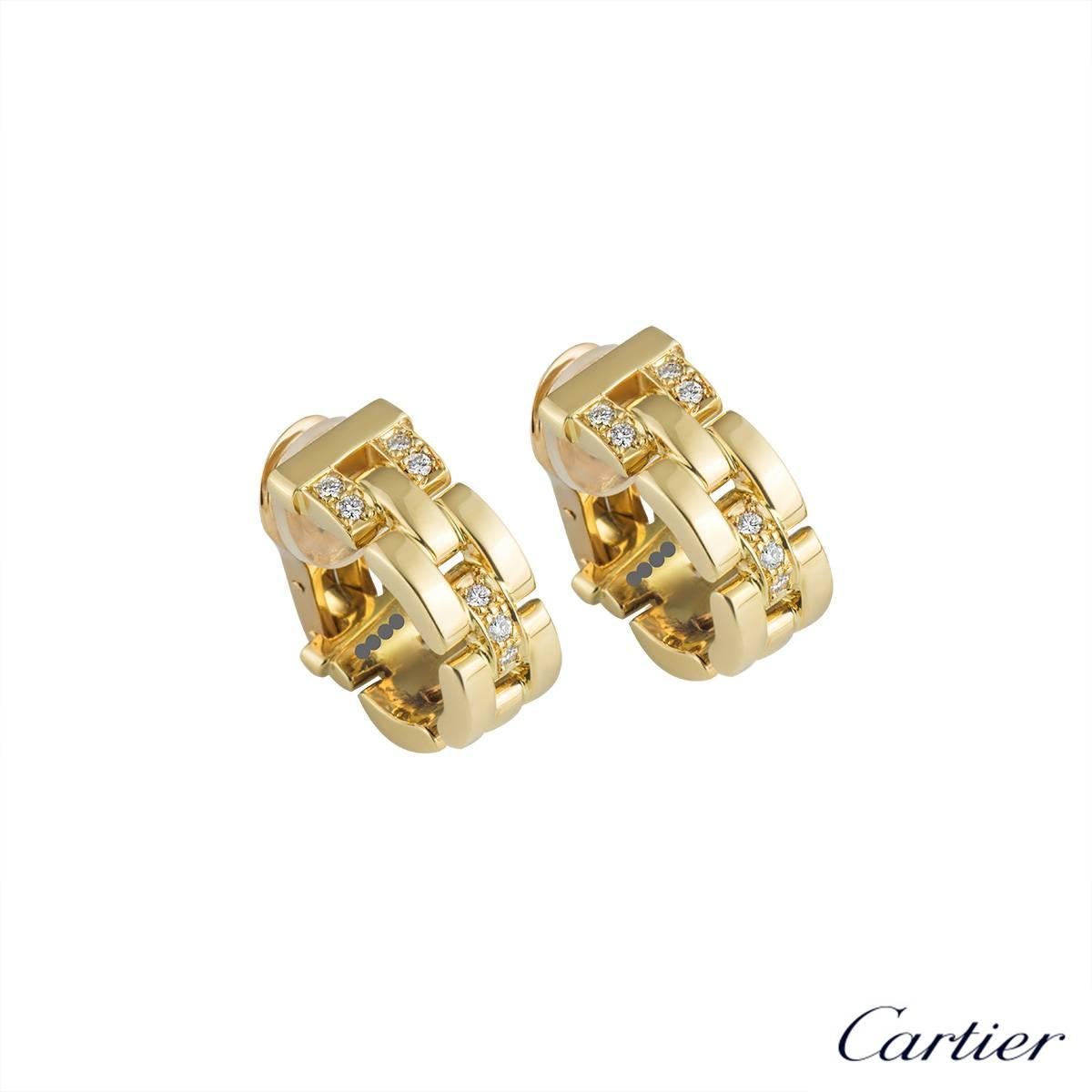 A pair of 18k yellow gold Maillon Panthere earrings by Cartier. Each hoop style earring is made up of iconic flat 18k yellow gold solid links with 3 pave set diamond intersections, totalling approximately 0.20ct. The earrings measure 2cm X 0.8cm and