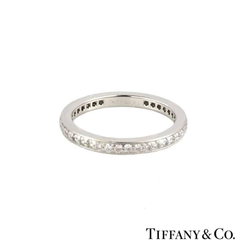 A beautiful diamond set full eternity ring in platinum from the Legacy collection by Tiffany & Co. The ring is set with 40 round brilliant cut diamonds throughout the centre in a pave setting and complemented by a milgrain edge. The diamonds total