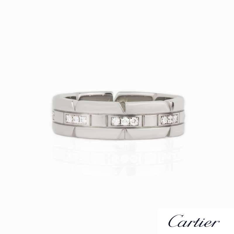 A classic Cartier Tank ring. The 18k white gold ring is set with 24 round brilliant cut diamonds. The size of the ring is a US size 6 1/2, EU size 53 and UK size N. Model Reference B4060100.

Complete with Original Cartier Box and Rich Diamonds