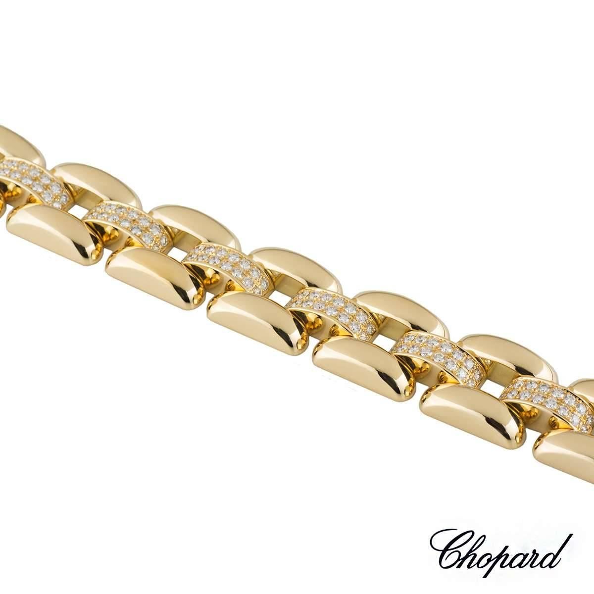 A beautiful 18k yellow gold diamond set Chopard bracelet from the La Strada collection. The bracelet comprises of 3 rows of gold links, the centre row has 192 round brilliant cut diamonds pave set with a total of approximately 3.26ct, colour G and