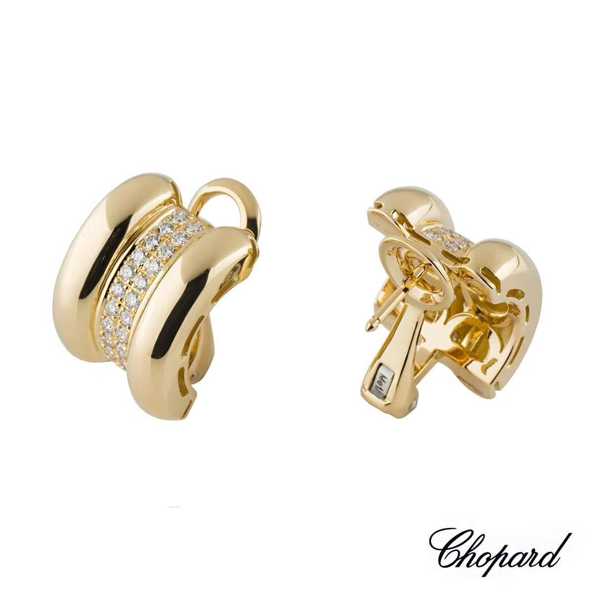 A classic pair of 18k yellow gold Chopard diamond earrings from the La Strada collection. The earrings are comprised of three sections and cuff over the earlobe, the inner sections is pave set with 44 round brilliant cut diamonds totalling 0.92ct, G