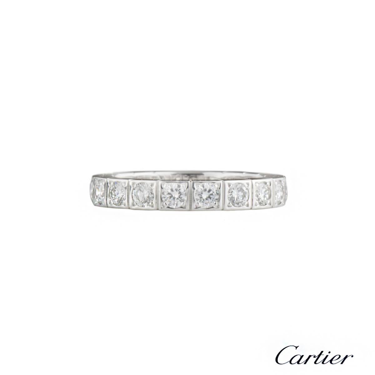 An 18k white gold Lanieres diamond set band by Cartier. The signature band is made up of 16 square solid links each set with a single round brilliant cut diamond, totalling approximately 0.80ct. The ring has a smooth polished section displaying the