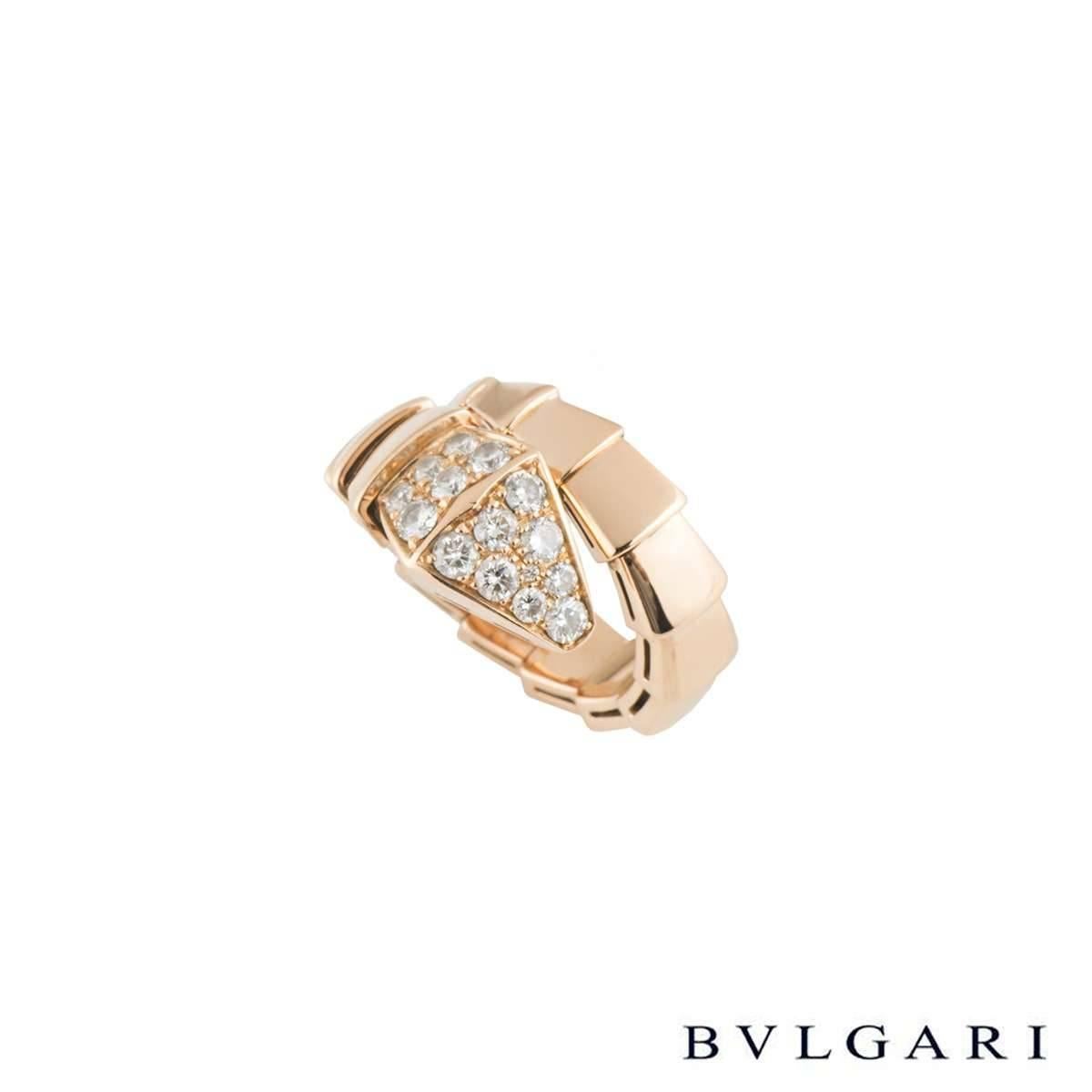 A luxurious 18k rose gold Bvlgari diamond ring from the Serpenti collection. The ring is in the form of a serpent wrapping around the finger, comprising 15 graduating flexible intersections including the diamond set head of a snake. The head has 15