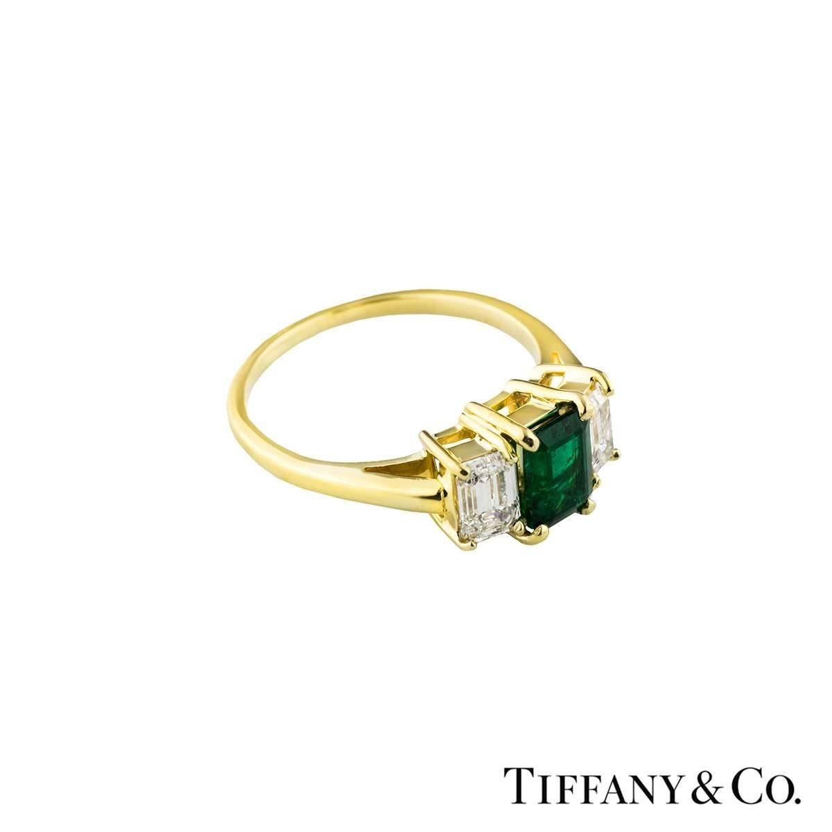emerald and diamond ring yellow gold