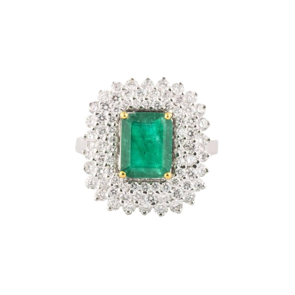 Emerald Cut White Gold Diamond and Emerald Ring