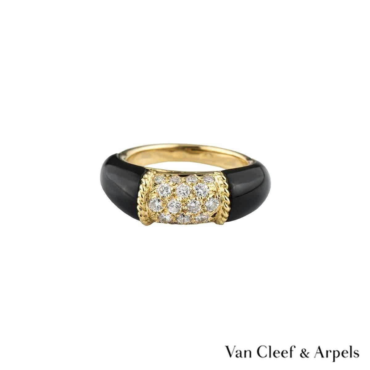 An 18k yellow gold ring from the Philippine collection by Van Cleef & Arpels. The central motif is set with 18 round brilliant cut diamonds totalling approximately 0.50ct, predominantly G colour and VS clarity. The diamond motif has a ropetwist