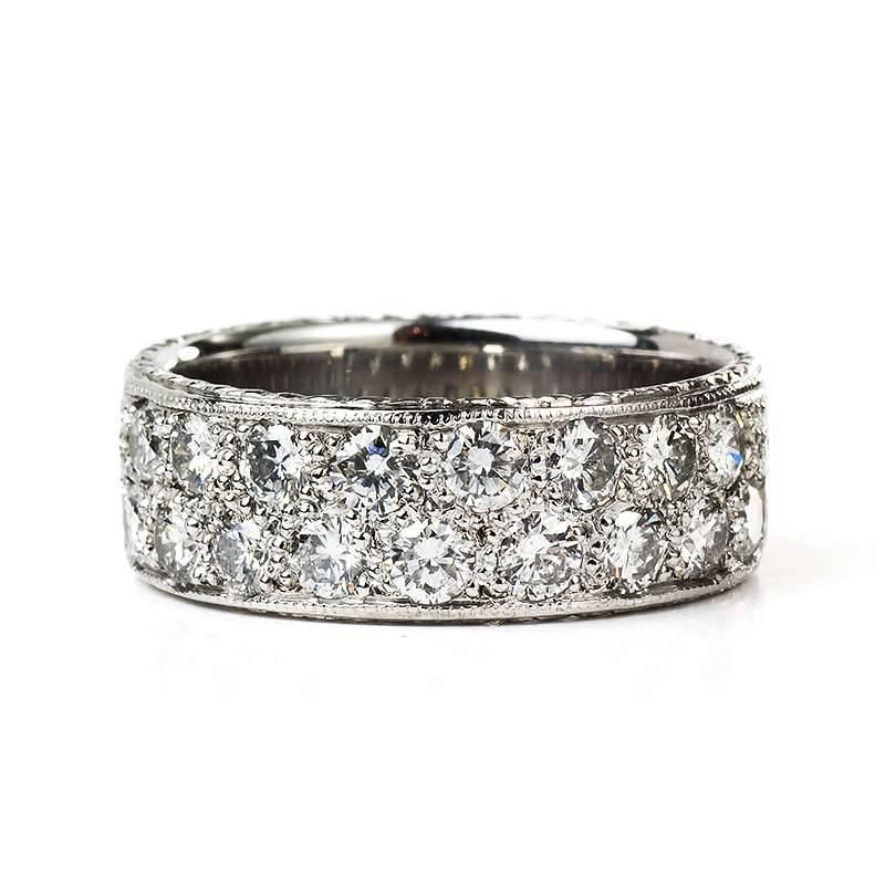 An 18k white gold diamond set wedding band with round brilliant cut diamonds totalling approximately 1.00ct. The diamonds are G in colour and VS clarity.The ring is a size UK O/ US 7, EU 55.