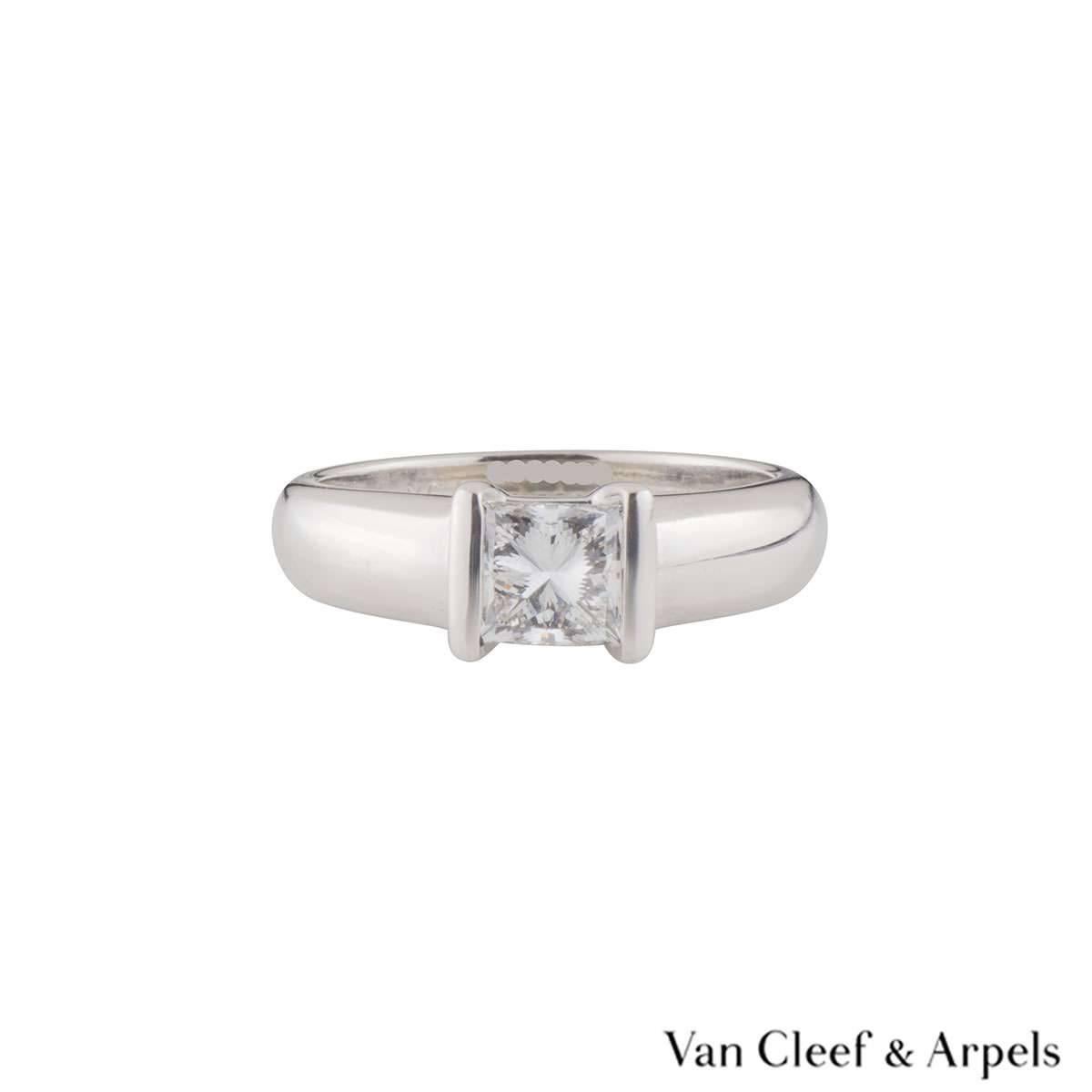 A beautiful 18k white gold Van Cleef & Arpels diamond engagement ring. The ring comprises of a princess cut diamond in a tension setting with a weight of 1.01ct, E colour and VVS1 clarity. The ring is a US size 6, EU size 52 and UK size M but