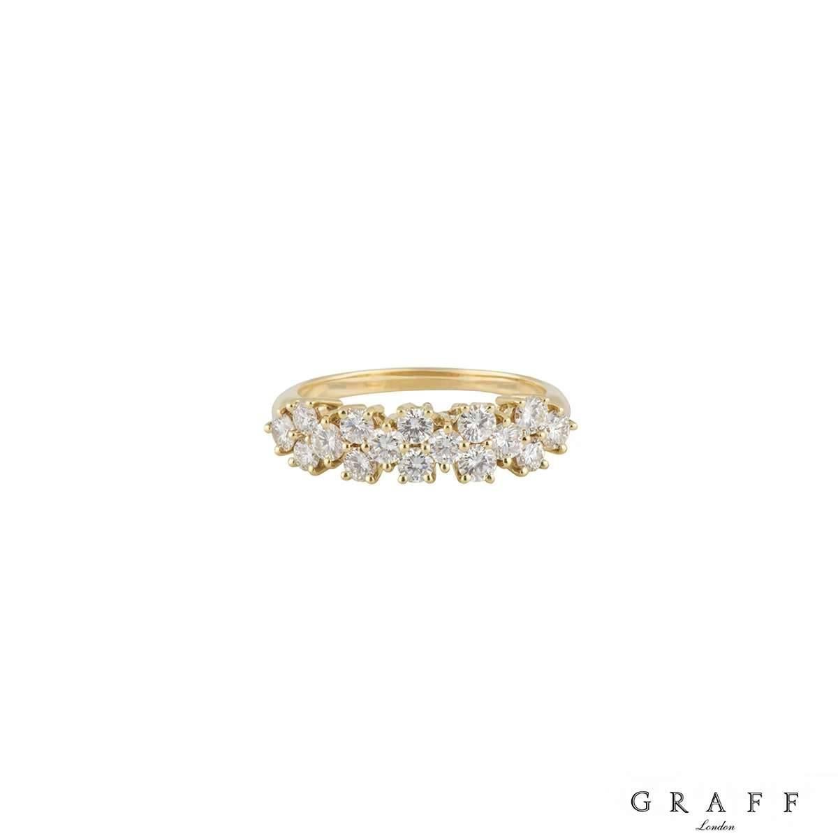 An 18k yellow gold diamond half eternity ring by Graff. The ring has 16 round brilliant cut claw set diamonds totalling approximately 1.60ct, predominantly F colour and VVS clarity. The front of the ring measures 5mm in width and tapers down to a