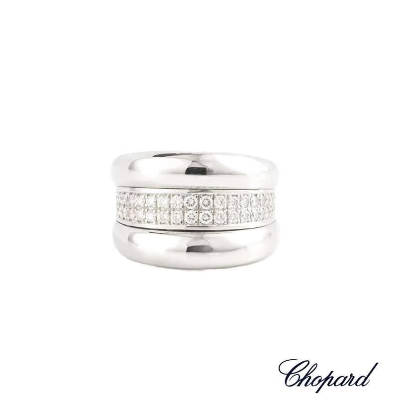 A wonderful 18k white gold diamond set dress ring from the La Strada collection by Chopard. The ring is set to the centre with two rows of pave set round brillant cut diamonds totalling 0.62ct, G colour and VS in clarity and is surrounded by a