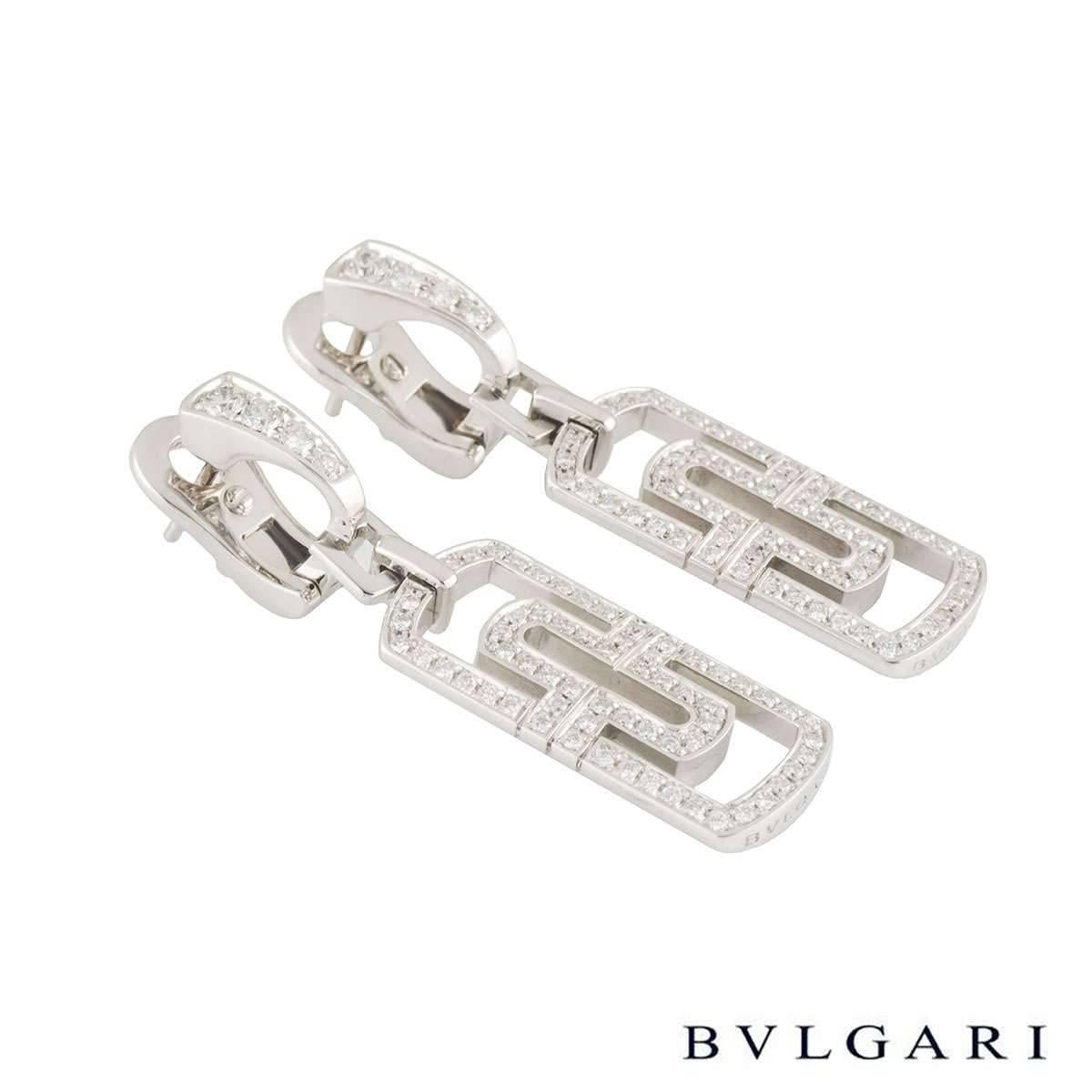 A pair of 18k white gold Bvlgari drop earrings from the Parentesi collection. The earrings comprise of the parentesi motif with 132 round brilliant cut diamonds totalling approximately 1.14ct, G colour and VS clarity. The earrings feature a post and