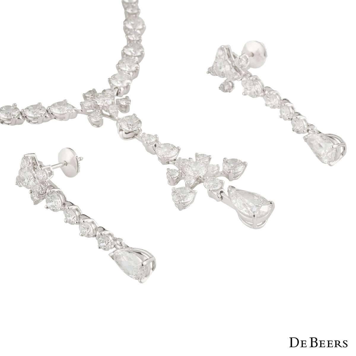 An exquisite necklace and earring suite in platinum from the Lea collection by De Beers. The necklace is comprised of 110 diamonds with a total diamond weight of 14.95ct. The feature diamond is a pear cut weighing 1.51ct, G colour and SI2 clarity.