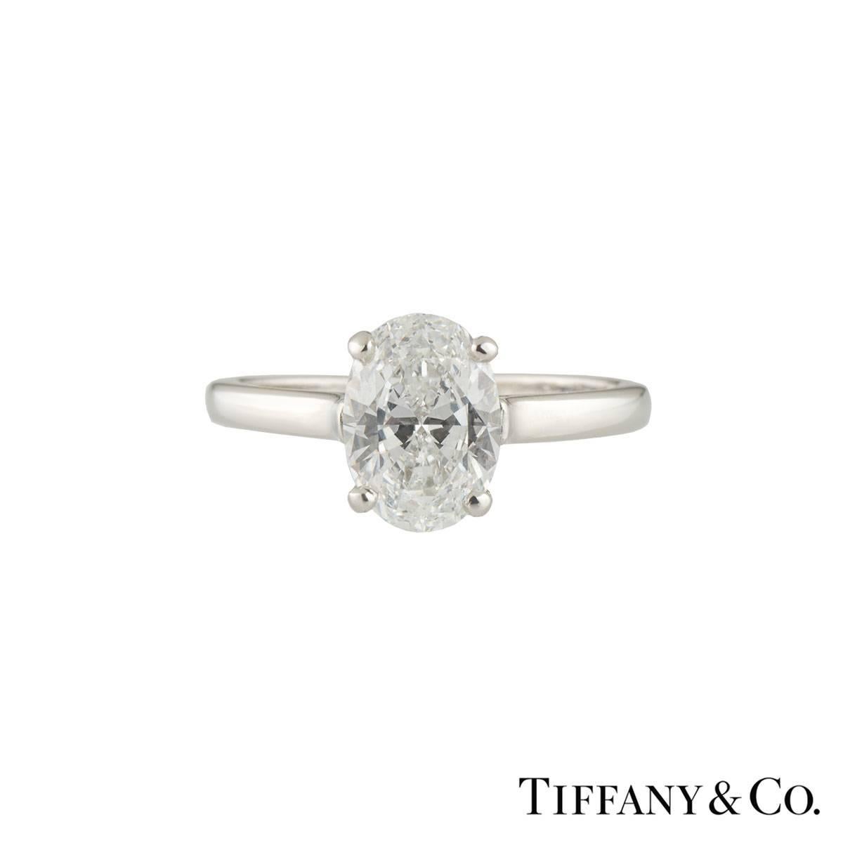 A stunning platinum Tiffany & Co. diamond engagement ring from the Oval Shape collection. The ring comprises of a oval cut diamond in a 4 claw setting, with a weight of 1.60ct, E colour and VVS1 clarity. The ring is a US size 6 1/2, Eu 53.5 and