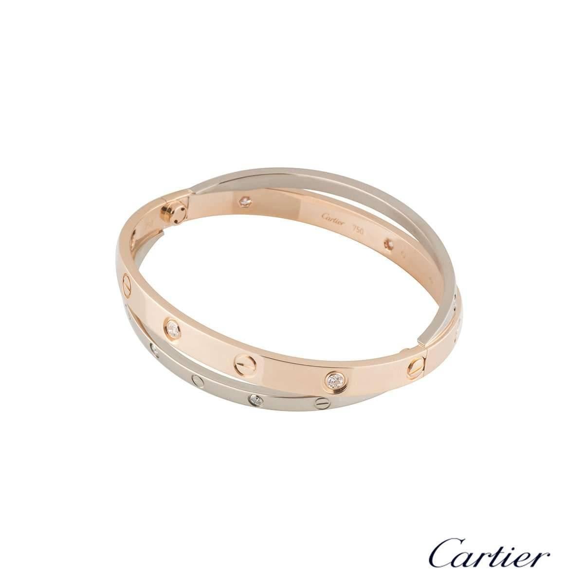 A double Cartier 18k rose and white gold Love bangle. The predominant 18k rose gold bangle is set with 6 round brilliant cut diamonds and alternating screw motifs. Interlinking is an 18k white gold band on either side also displaying the alternating