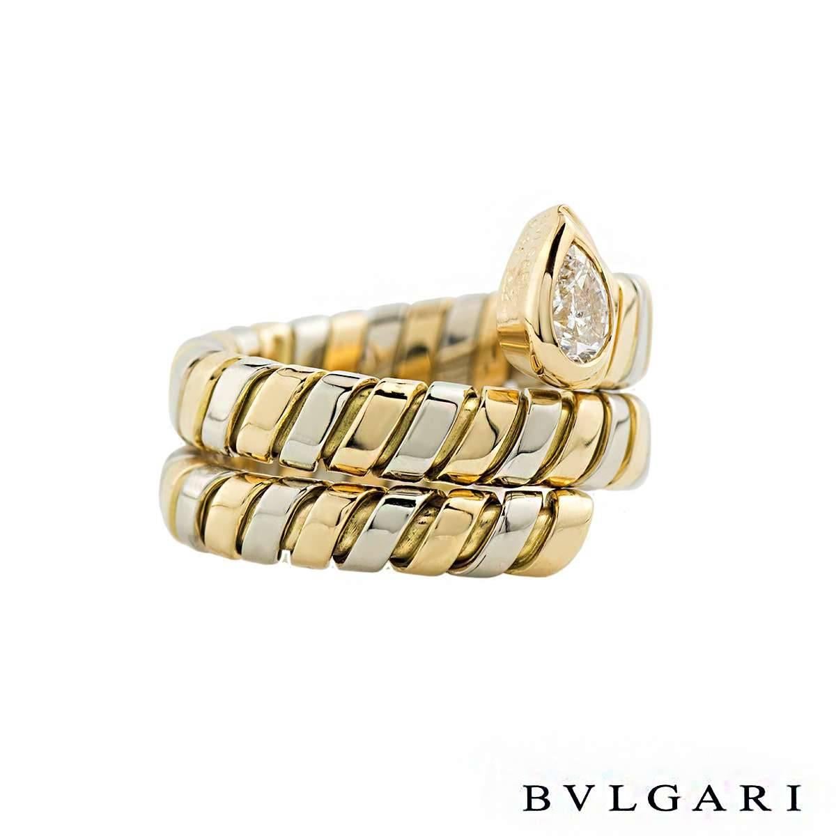 A trendy 18k yellow and white gold diamond Bvlgari ring from the Tubogas collection. The ring comprises of a pear cut diamond with a total carat weight of 0.38ct, G colour and VS clarity, set to a flexi link serpant design band. The ring is 1.7cm in
