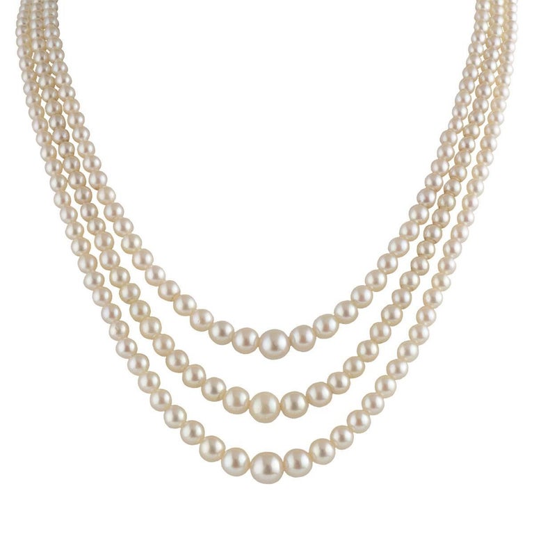 ThreeStrand Pearl Necklace with Diamond and Sapphire Clasp at 1stDibs three strand pearls