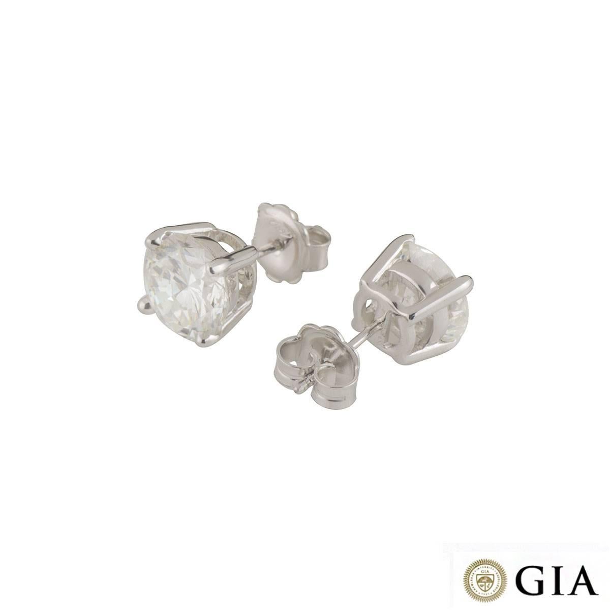 Round Cut GIA Certified Diamond Stud Earrings Total 5.12 carats