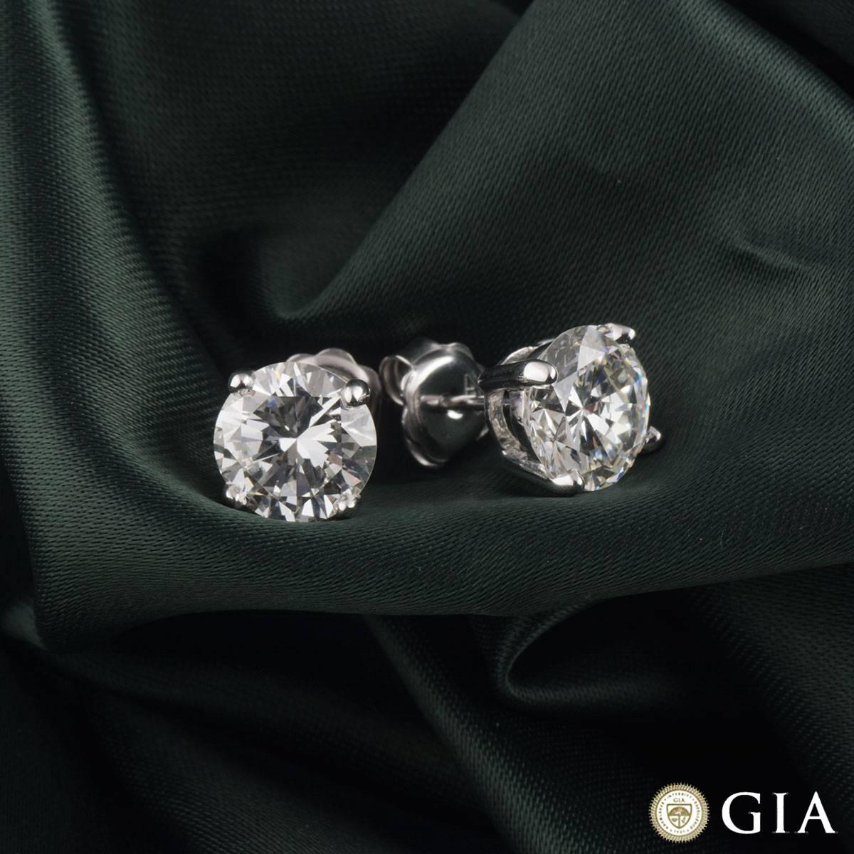 Women's GIA Certified Diamond Stud Earrings Total 5.12 carats