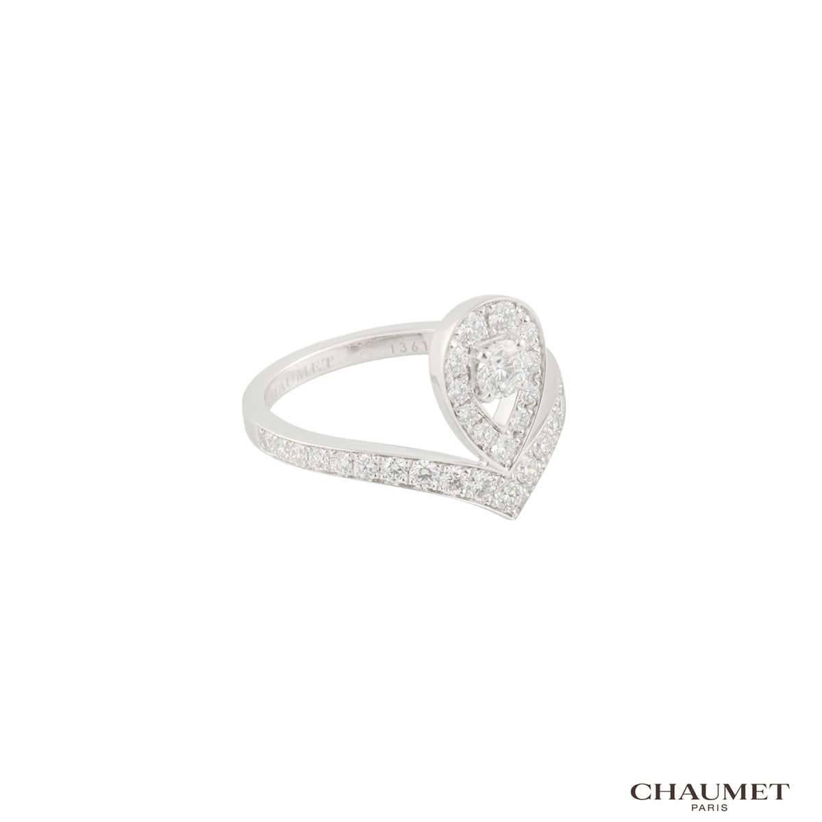 A stunning 18k white gold diamond Chaumet dress ring from the Josephine Aigrette collection. The ring comprises of a tiara style motif crowning the finger. The motif has a single round brilliant cut diamond weighing 0.18ct, G colour and VS+ clarity