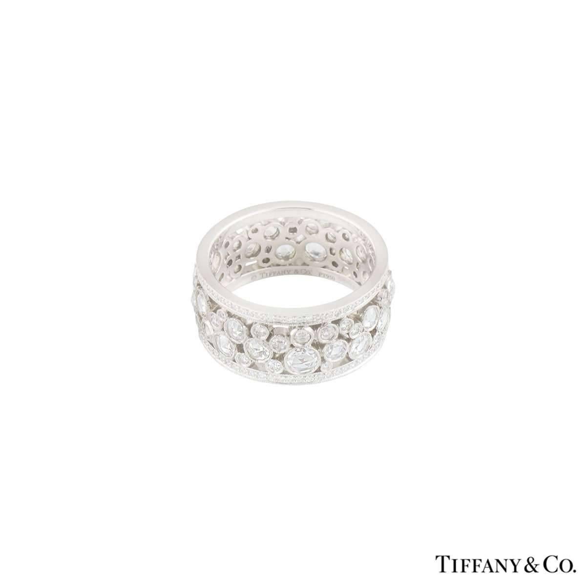 A stunning diamond ring in platinum from the Cobblestone collection by Tiffany & Co. The ring is set with rose cut diamonds varying in size, totalling 1.62ct and pave set round brilliant cut diamonds totalling 0.52ct. The ring measures 0.10mm in