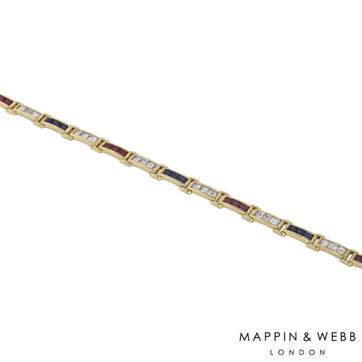 An 18k yellow gold diamond and multi-gem bracelet by Mappin & Webb. The bracelet comprises of diamonds, sapphires and rubies alternating with each other in rows of three. The bracelet features 24 square modified brilliant diamonds, 12 sapphires and