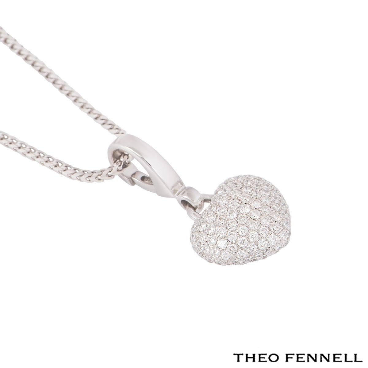 An 18k white gold Theo Fennell heart pendant. The pendant features a love heart centre piece set with round brilliant cut diamonds in a pave setting with a total weight of approximately 1.13ct. The pendant features a 15.60 inch Theo Fennell spiga