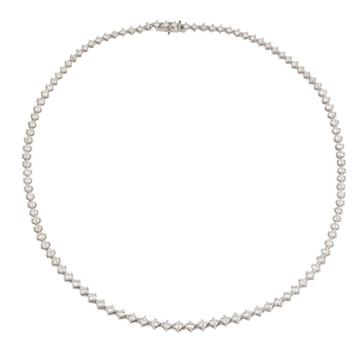 A beautiful 18k white gold full diamond necklace. The necklace has a 109 round brilliant cut diamonds totalling to 7.63ct, G-H colour and VS clarity. The necklace features a box clasp and another lever which crosses over double locking it. The