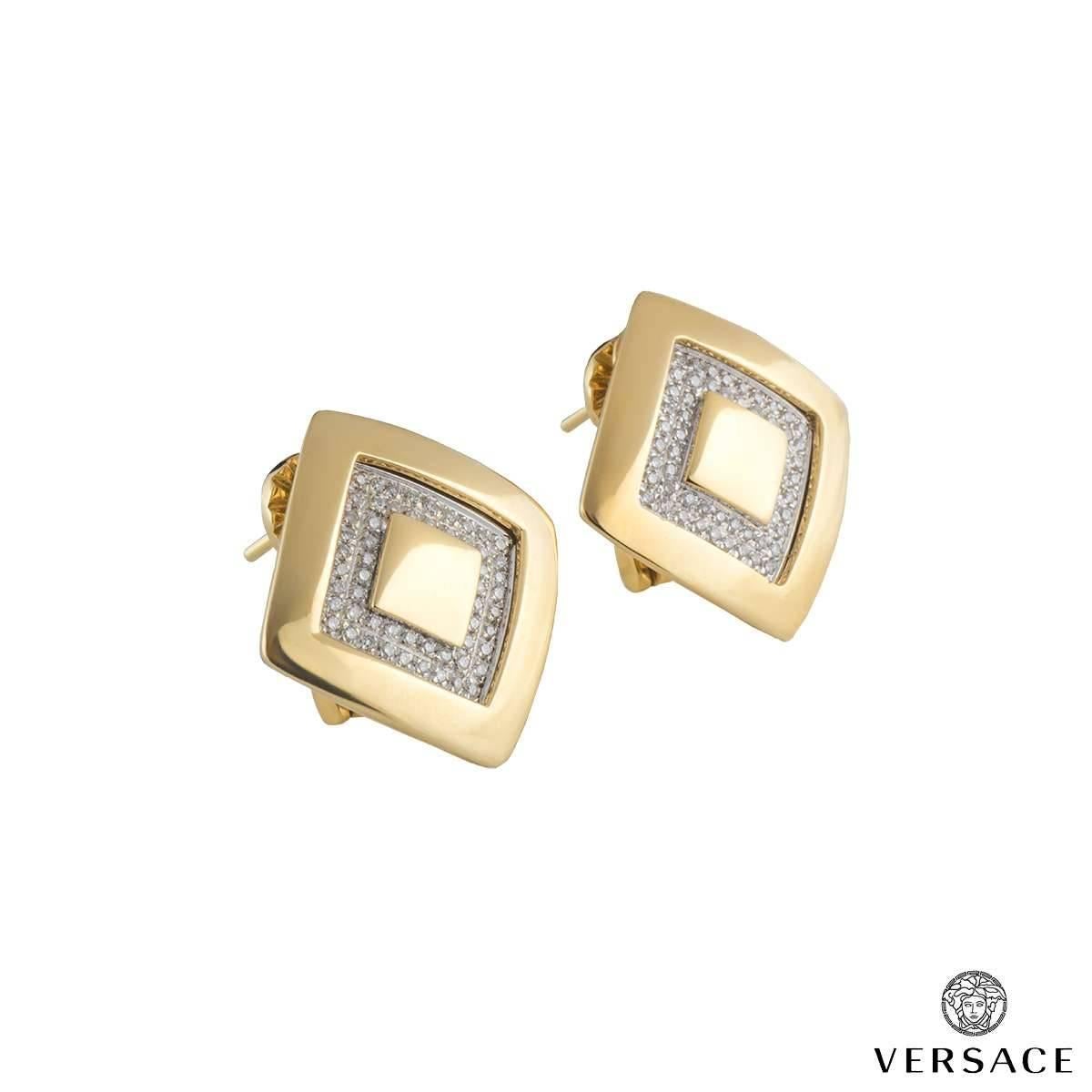 A statement Versace suite. The 18k yellow gold pendant and earrings are of geometric design with a diamond set inner boarder. The diamonds are bright, Colour G, Clarity VS, totalling approximately 0.84ct. The gross weight of all three pieces totals