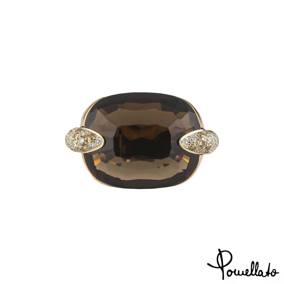 A statement 18k rose gold diamond and quartz Pomellato ring. The ring comprises of a 20.00 carat brown quartz gemstone with diamond set terminations on either side. There are 52 round brilliant cut brown and white diamonds with an approximate weight