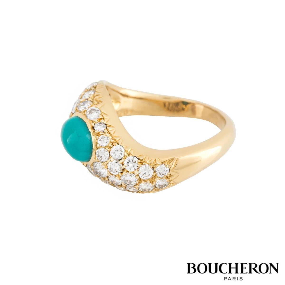 An 18k yellow gold dress ring by Boucheron. The ring is in the style of a wave comprising of a single oval cabochon cut turquoise stone, surrounded by a cluster of round brilliant cut diamonds totalling approximately 0.60ct. The ring is currently a