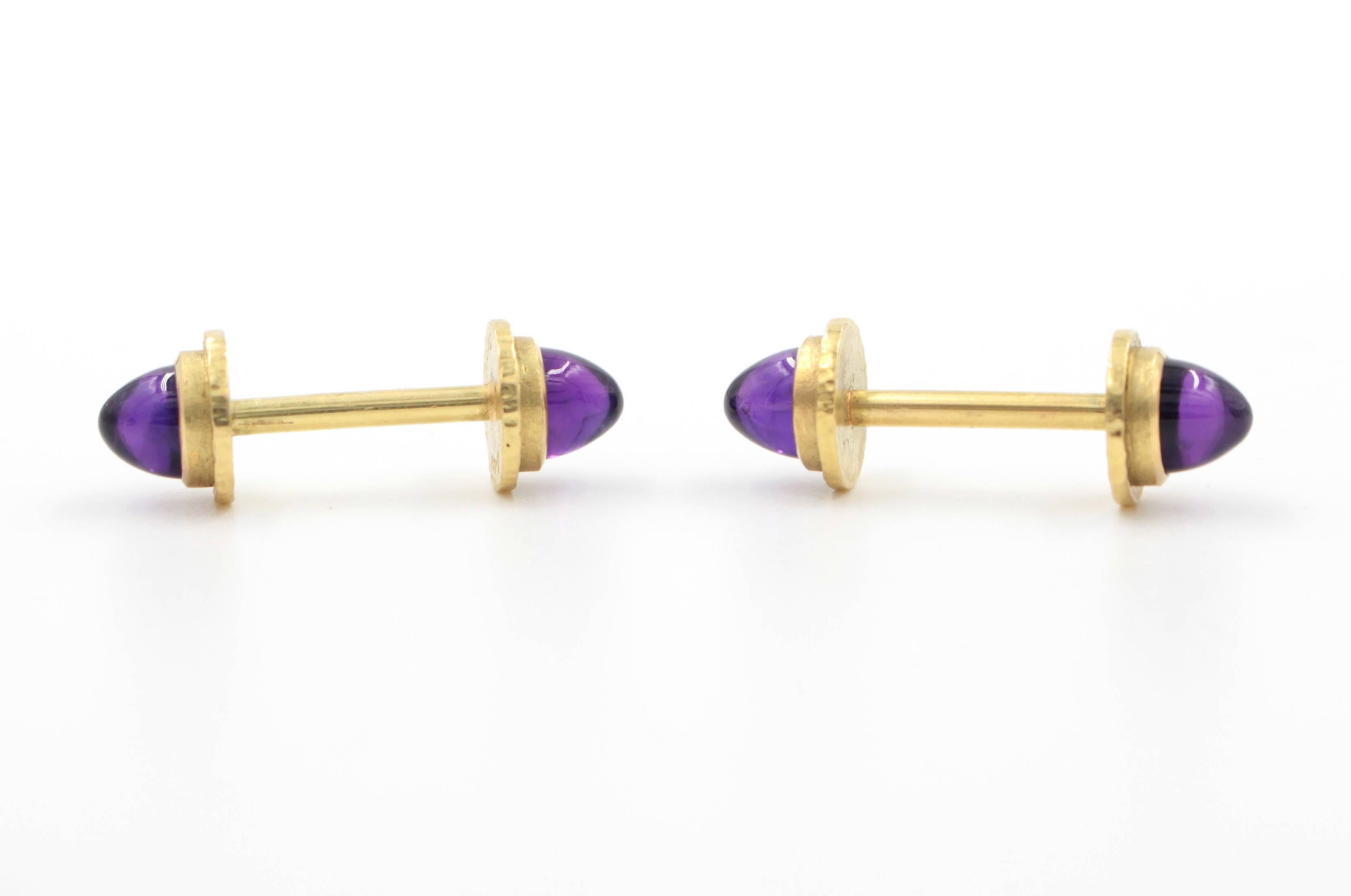 18k gold fabricated and hammer-edged cufflinks with 5.85 ct amethyst cabochons.