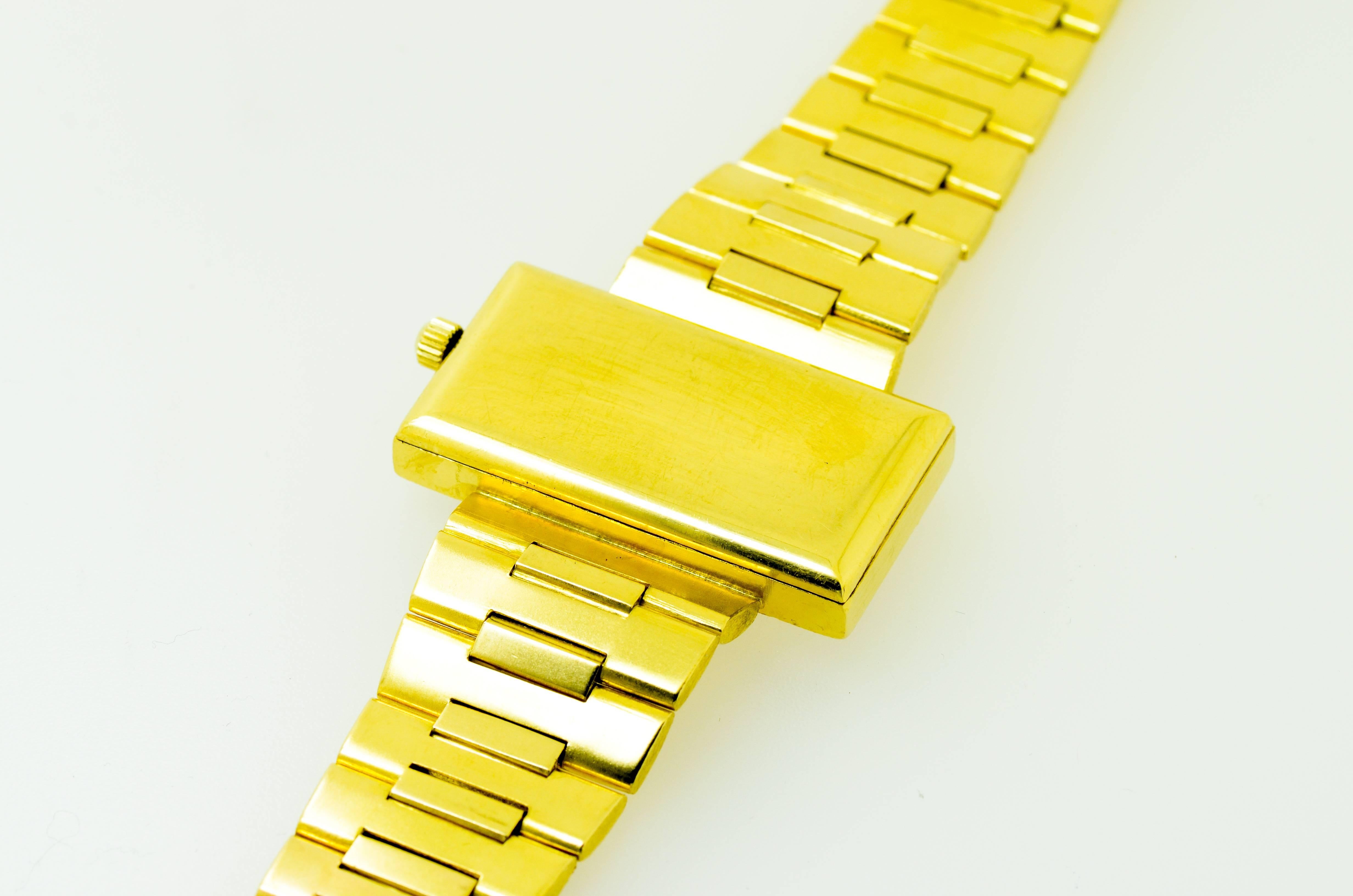 A beautiful original Omega 'Emerald' ladies wristwatch in full 18 karat yellow gold and gold detailing throughout.