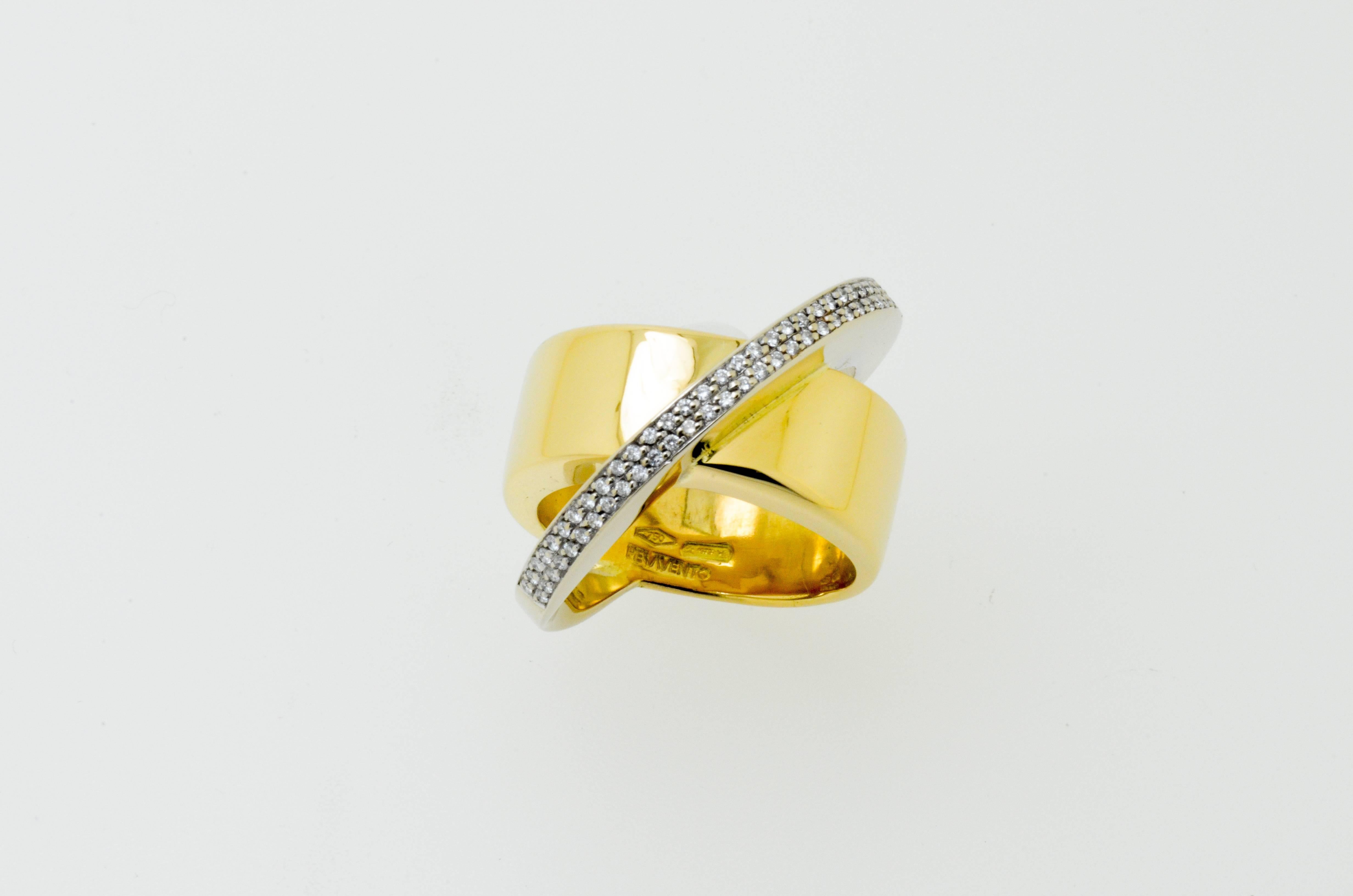 One 18 Karat yellow and white gold diamond Pesavento ring consisting of 0.50 carats of clean white briliant cut diamonds.

Size: M