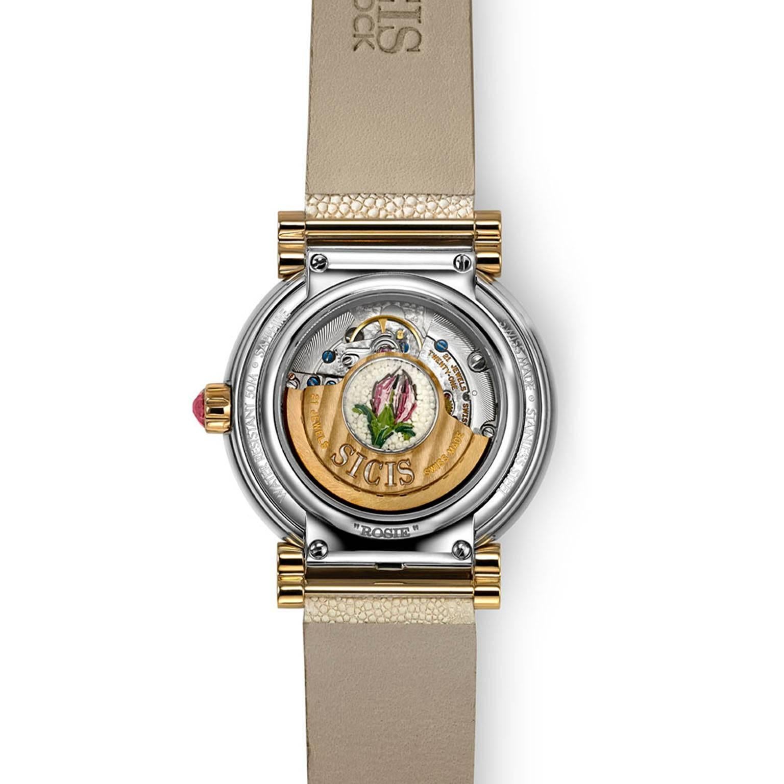 Micromosaic watch with gold and steel case, Swiss Made, Automatic Movement. Galuchat strap. 

Micromosaic Rotor. 

Steel Case (40 mm) 
Nano­Mosaic ­ 
Sapphire Glass ­ 
Automatic Movement (Swiss Made)
Silver 925‰ 
Pink Sapphire 

All items with