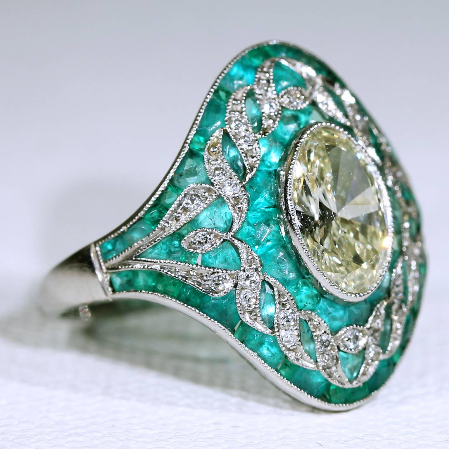 Every once in a great while, I come across a piece of jewelry that shows such a high level of skill in the crafting that it crosses the line between art and jewelry. This ring is just such a piece, the emeralds are all custom cut and made to fit