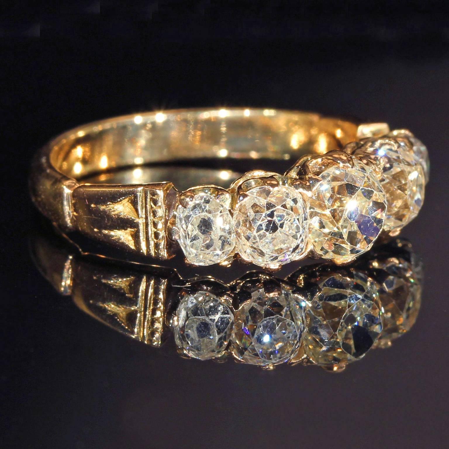 Once you start wearing Old cut diamonds, it’s very hard to go back. These individually hand cut artisanal stones have such a personality and life of their own. This Victorian five stone diamond ring was made in about 1870. 

This ring was hand