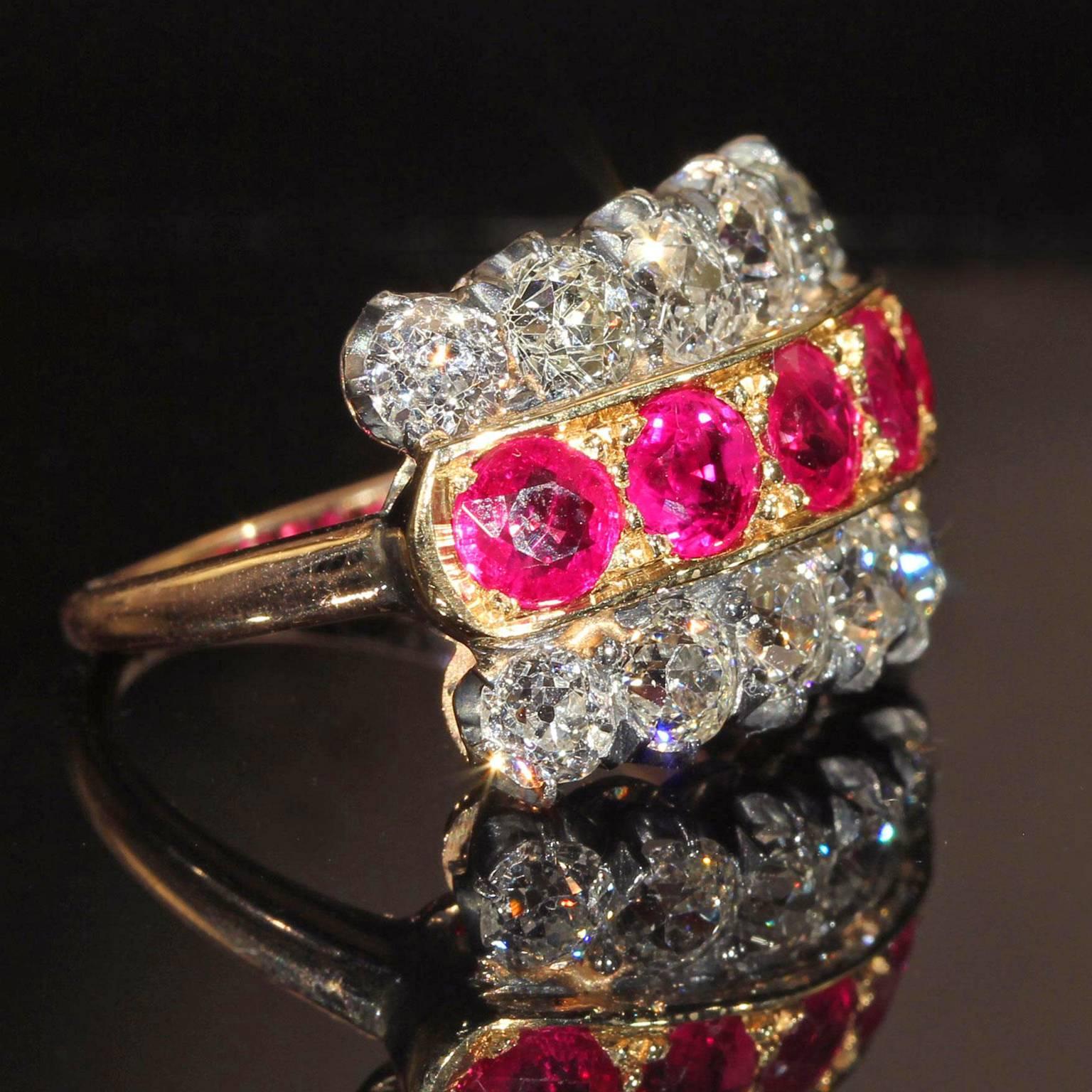This show stopping Victorian Ring contrasts bright and sparkling Old cut diamonds with lively rich red rubies. 

This wonderful ring was handcrafted in England around 1890. The ring contains five bright red rubies kissed with pink, they measure 5 x